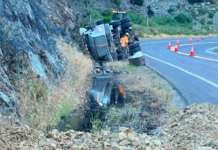 Truck Transporting Hazardous Materials Crashes, Closing Hwy. 199, Injuring the Driver and Spilling Material into Smith River